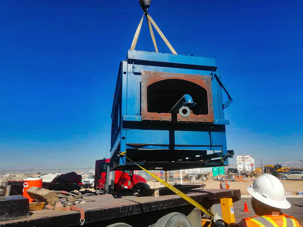 Método de manipulación de cargamento industrial en grúa